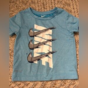Toddler 2T Nike top. Small untreated stain on front by lower check mark.
